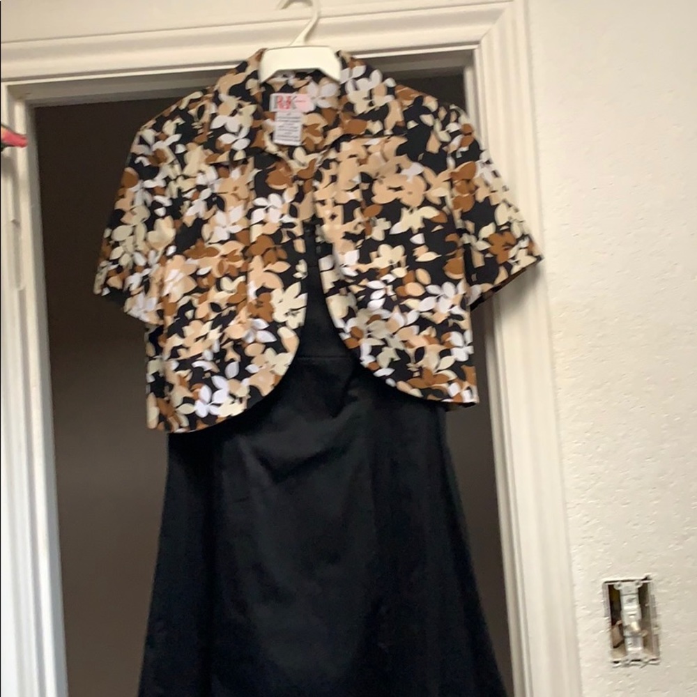 Dress with jacket Jacket color is black brown